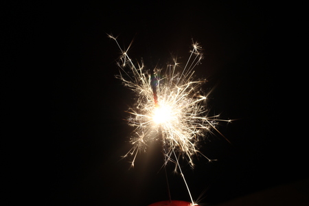 Christmas colorful sparklers holiday background for xmas new yearの写真素材