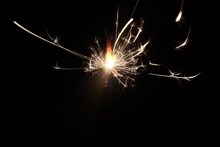 Christmas colorful sparklers holiday background for xmas new yearの写真素材