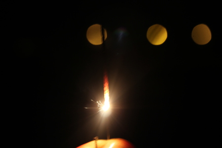 Christmas colorful sparklers holiday background for xmas new yearの写真素材