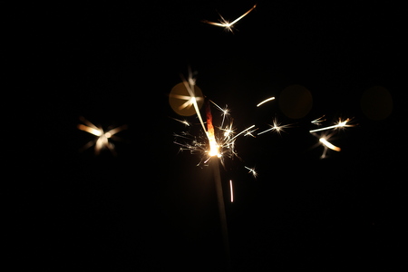 Christmas colorful sparklers holiday background for xmas new yearの写真素材