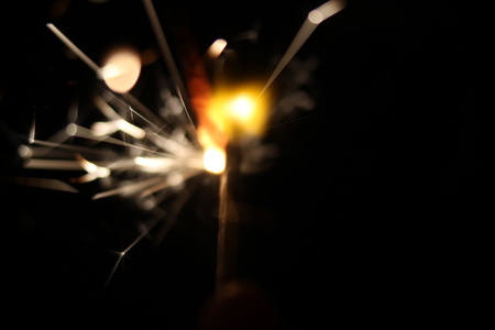 Christmas colorful sparklers holiday background for xmas new yearの写真素材