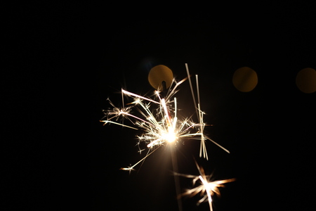 Christmas colorful sparklers holiday background for xmas new yearの写真素材