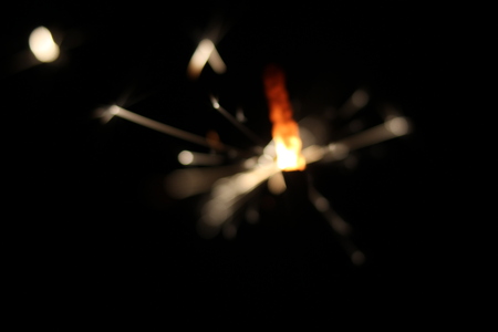 Christmas colorful sparklers holiday background for xmas new yearの写真素材