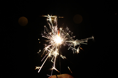 Christmas colorful sparklers holiday background for xmas new yearの写真素材