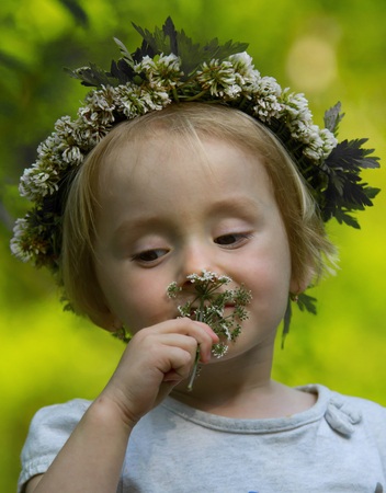 Girl with wreath in her hairの写真素材