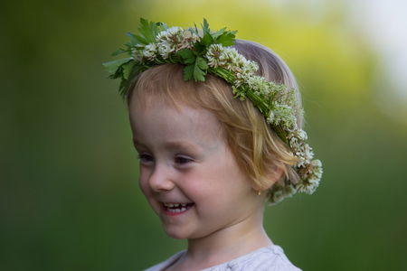 Girl with wreath in her hairの写真素材