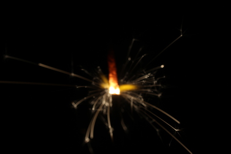 Christmas colorful sparklers holiday background for xmas new yearの写真素材