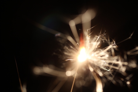 Christmas colorful sparklers holiday background for xmas new yearの写真素材