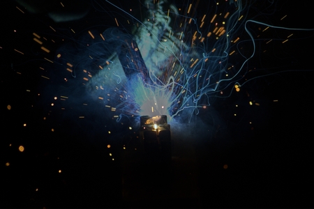 Welding steel with sparksの写真素材