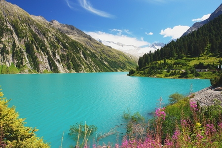 View of the alpine lake in the valley Zillertal, Austrian Alpsの写真素材