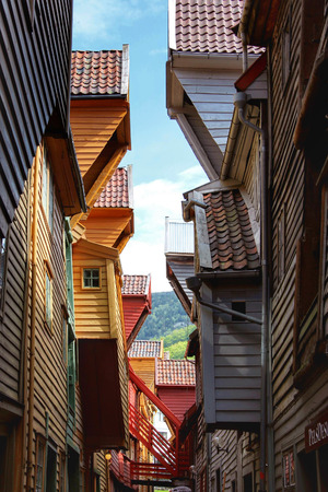 BERGEN, NORWAY - MAY 19, 2014: Colorful wooden houses, Bryggen, in the city of Bergen. Bryggen is also known as the Tyskebryggen.のeditorial素材