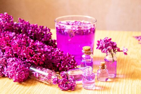 lilac oil in small bottles. selective focusの写真素材