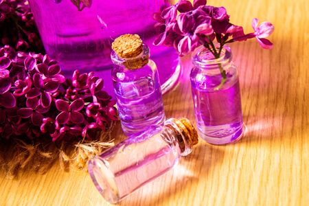 lilac oil in small bottles. selective focusの写真素材