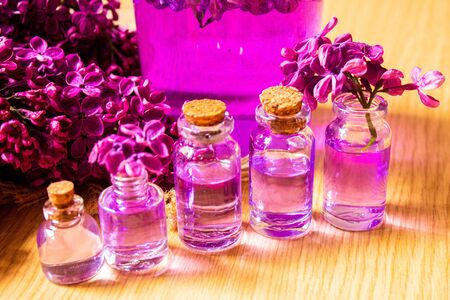 lilac oil in small bottles. selective focus.natの写真素材
