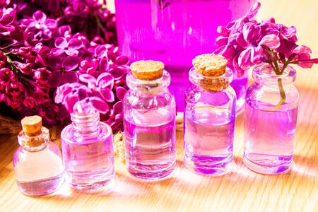 lilac oil in small bottles. selective focus.natの写真素材