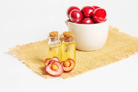 cherry oil in a small jar. selective focus. nature.medicalの写真素材