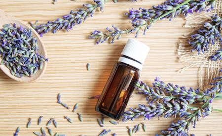Lavender essential oil in a small bottle. Selective focus. nature.の写真素材