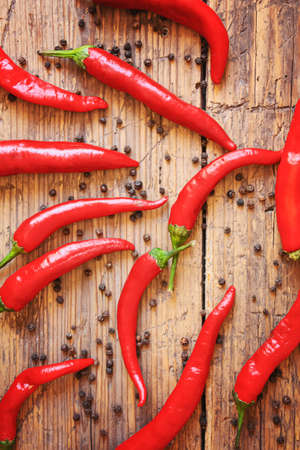 hot chili peppers on wooden background. selective focusの写真素材