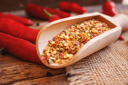 hot chili peppers on wooden background. selective focusの写真素材
