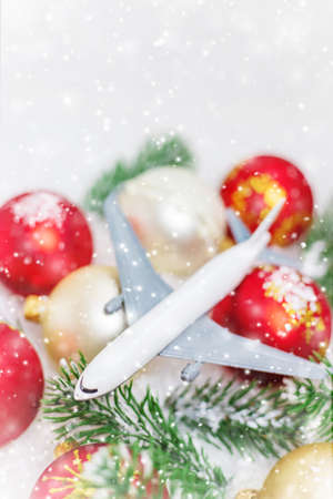 Travel for Christmas. Airplane with Christmas decor. Selective focus.Holidayの写真素材