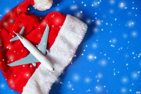 Travel for Christmas. Airplane with Christmas decor. Selective focus.Holiday