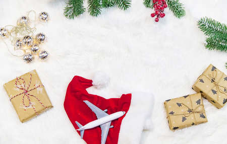 Travel for Christmas. Airplane with Christmas decor. Selective focus.Holiday