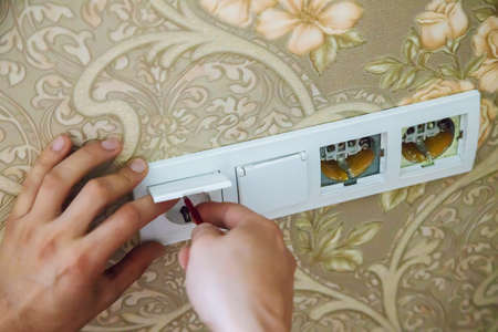 write electrical work, switch and socket installation.selectiv focus.industrial