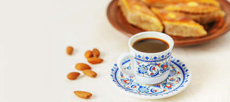 Turkish coffee and baklava on a light background. Selective focus. food.