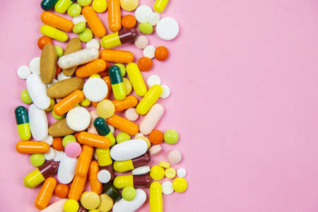 multicolored pills and medicines capsules omega 3 selective focus, medical
