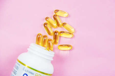 multicolored pills and medicines capsules omega 3 selective focus, medicalの写真素材