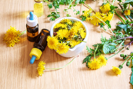 Celandine dandelion extract in a littel bottle, treatment, medicine, tincture. selective focus.natureの写真素材