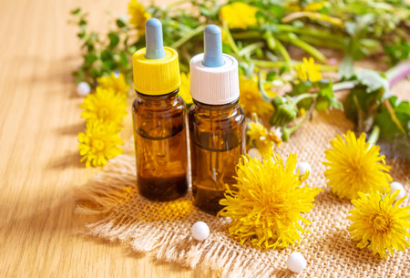 Celandine dandelion extract in a littel bottle, treatment, medicine, tincture. selective focus.natureの写真素材