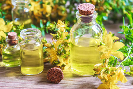 extract St. John's wort in a small jar. Selective focus.natureの写真素材