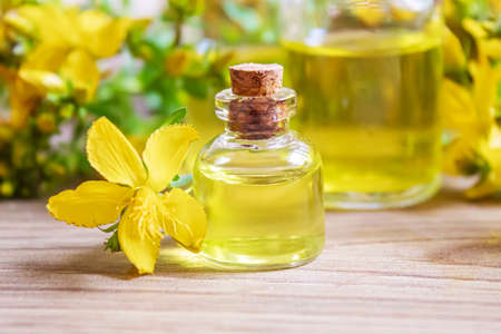 extract St. John's wort in a small jar. Selective focus.natureの写真素材