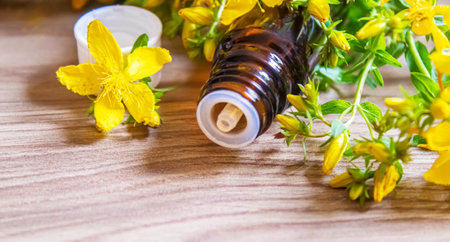 extract St. John's wort in a small jar. Selective focus.natureの写真素材