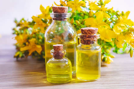 extract St. John's wort in a small jar. Selective focus.natureの写真素材
