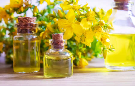 extract St. John's wort in a small jar. Selective focus.natureの写真素材