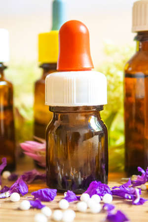 medicinal herbs, oils in small bottles homeopathy. selective focus.natureの写真素材