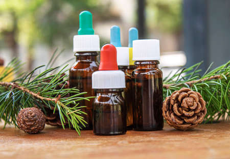 Fir tree essential oil in small bottles. Selective focus.natureの写真素材