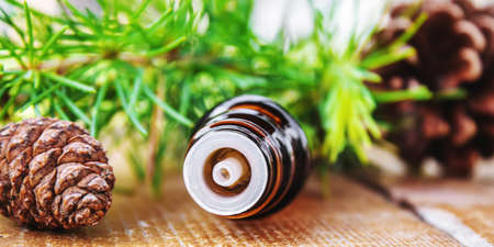 Fir tree essential oil in small bottles. Selective focus.natureの写真素材