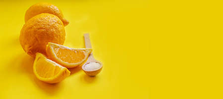 Citric acid on a yellow background. Selective focus.natureの写真素材