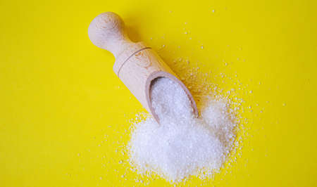 Citric acid on a yellow background. Selective focus.natureの写真素材