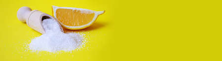 Citric acid on a yellow background. Selective focus.natureの写真素材