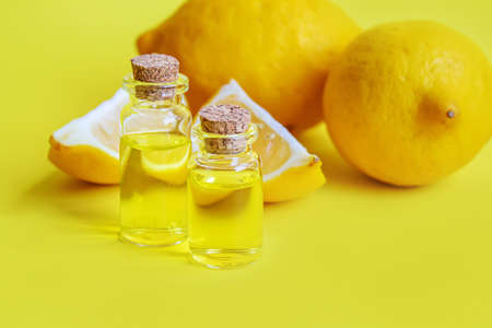 lemon essential oil on a yellow background. Selective focus.natureの写真素材