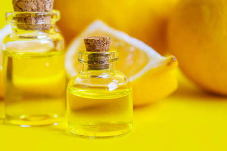 lemon essential oil on a yellow background. Selective focus.natureの写真素材