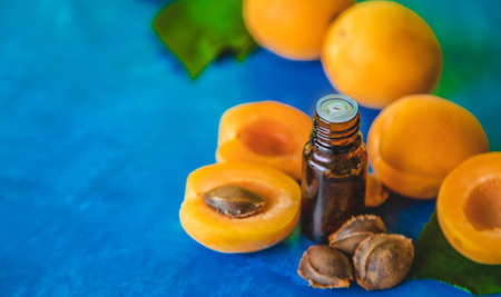Apricot kernel oil in a bottle. Selective focus. Nature.の写真素材