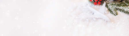 Travel for Christmas. Airplane with Christmas decor.New year.Selective focus.holidaysの写真素材