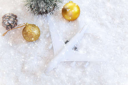 Travel for Christmas. Airplane with Christmas decor.New year.Selective focus.holidaysの写真素材