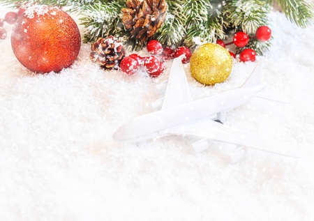 Travel for Christmas. Airplane with Christmas decor.New year.Selective focus.holidaysの写真素材