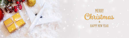 Travel for Christmas. Airplane with Christmas decor.New year.Selective focus.holidaysの写真素材